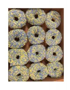 Green and blue sprinkle donuts.